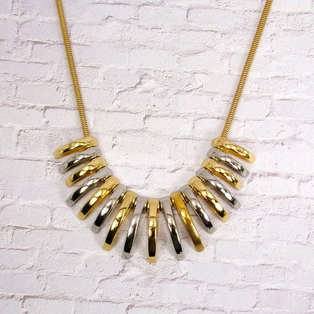Silver and gold necklace with dome shape metal links attached to a snake chain - Picture 3 of 8